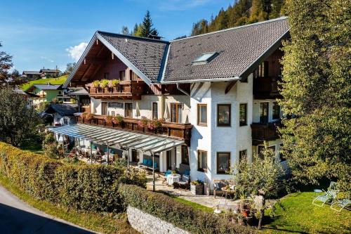 an aerial view of a large house at Sportpension Bergblick in Wagrain