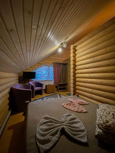 a room with a bed with a starfish on it at Skyta in Vorokhta