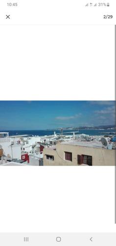 a view of a city from the top of a building at Dar 21 in Tangier