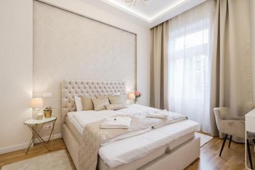 Postel nebo postele na pokoji v ubytování BpR Étienne Charming Apartment