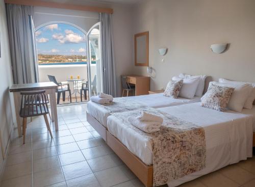 Posteľ alebo postele v izbe v ubytovaní Miva Sea View