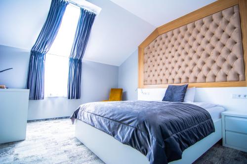 Posteľ alebo postele v izbe v ubytovaní Hotel Sjesta