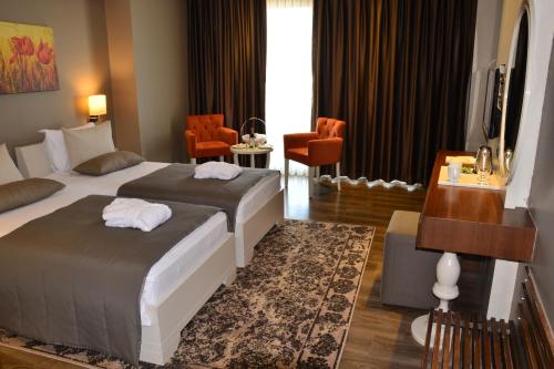 Letto o letti in una camera di Doğa Thermal Health & Spa