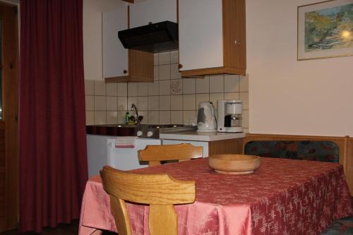 a kitchen with a table with a bowl on it at Haus Puit Mandarfen Pitztal in Sankt Leonhard im Pitztal