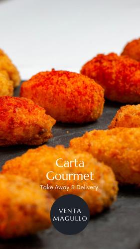 a bunch of fried food sitting on a table at Hotel Venta Magullo in La Lastrilla