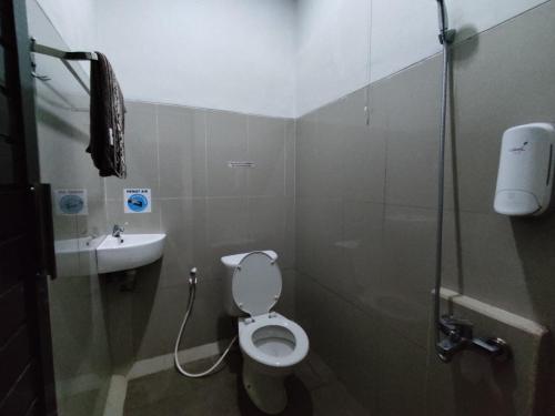 Ένα μπάνιο στο Alana House Syariah