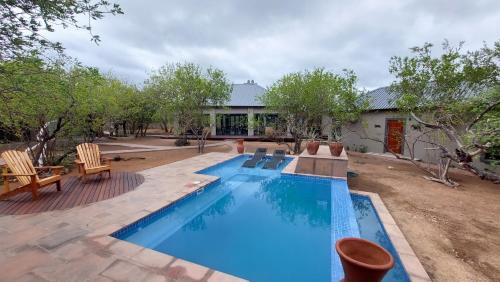 The swimming pool at or close to THE BAOBAB BUSH LODGE, no self catering