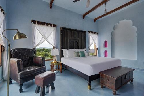 Cama o camas de una habitación en Maya Garh Pushkar