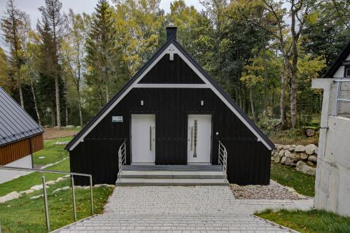 Vonkajšia záhrada v ubytovaní VacationClub – Szklarska Park VacationHome 1