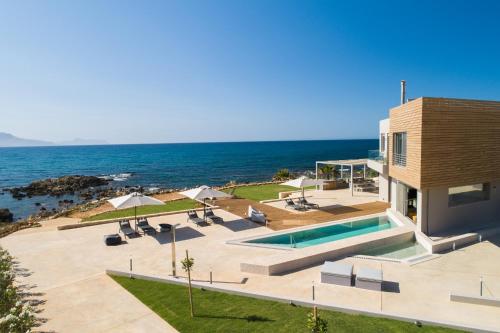 Your Private Retreat by the beach, with Heated Pool, by ThinkVilla