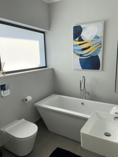 Un baño de Flat 14 Block 6 Bellamare