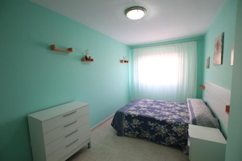 Un ou plusieurs lits dans un hébergement de l'établissement Spacious apartment for vacation in South Tenerife