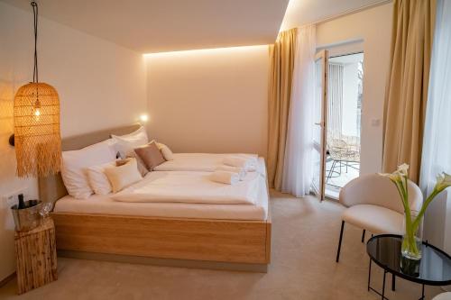 Ένα ή περισσότερα κρεβάτια σε δωμάτιο στο Hotel U Kaplicky