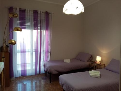 Posteľ alebo postele v izbe v ubytovaní BRUNO TURIN APARTMENT Near the METRO