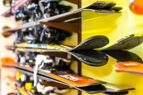 a group of skis on a shelf with spoons at Skyta in Vorokhta