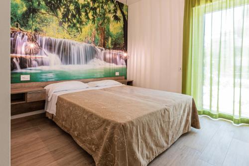 Postel nebo postele na pokoji v ubytování SeaPark SPA Resort