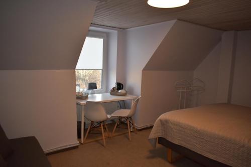 Postel nebo postele na pokoji v ubytování Guest House Gero Vėjo Namai