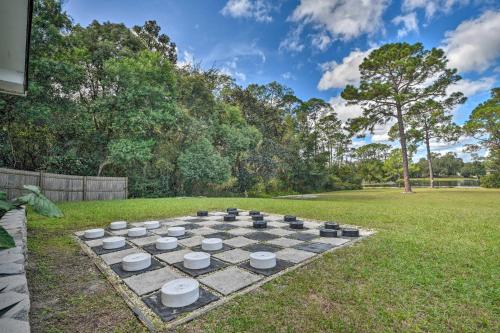 a chess board in the middle of a yard at Deltona Lake House, Day Trip to Disney and Universal in Deltona