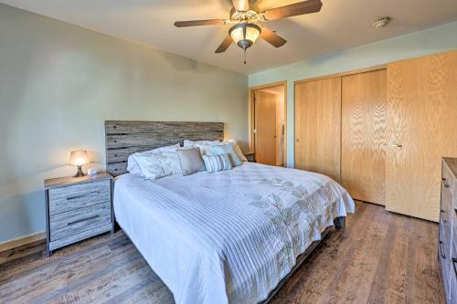 a bedroom with a bed and a ceiling fan at Steamboat Home with Garage, 1 Mi to Ski Resort in Steamboat Springs