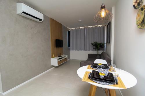 Et tv og/eller underholdning på Paraíso das águas, conforto e descanso com vista mar..