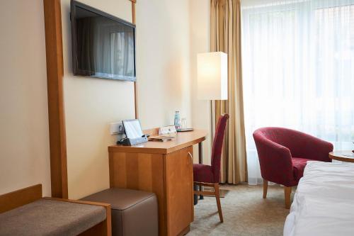 TV a/nebo společenská místnost v ubytování Flair Hotel Stadt Höxter