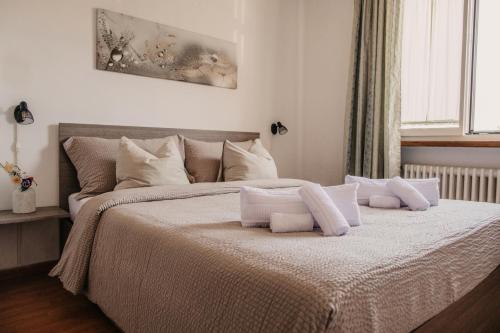 Ένα ή περισσότερα κρεβάτια σε δωμάτιο στο La Riva