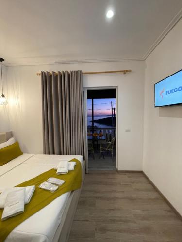 TV a/nebo společenská místnost v ubytování Relax Mea Hotel