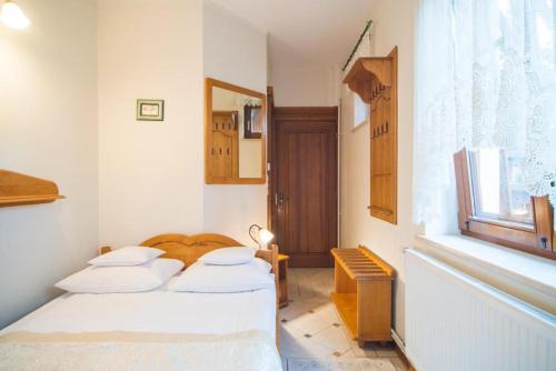 Katil atau katil-katil dalam bilik di Hotel Dwa Księżyce