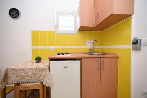 D&D Apartmentsにあるキッチンまたは簡易キッチン