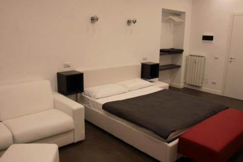 Cama o camas de una habitación en I LOVE ROMA Guest House