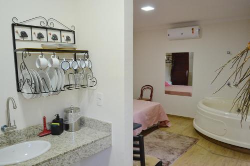 Et badeværelse på Pousada Recanto da Estação