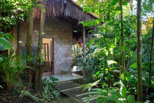 Jardín al aire libre en Pousada Seis e Meia