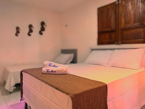 Postel nebo postele na pokoji v ubytování Suites RioMar