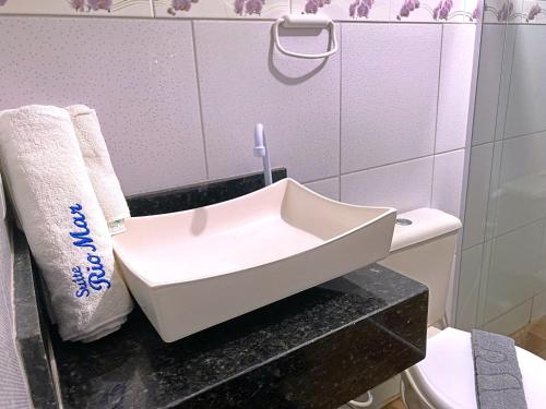 Koupelna v ubytování Suites RioMar