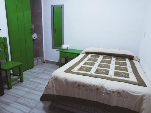 Cama o camas de una habitación en Posada