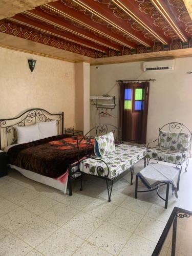 Ένα ή περισσότερα κρεβάτια σε δωμάτιο στο Bab Al Madina