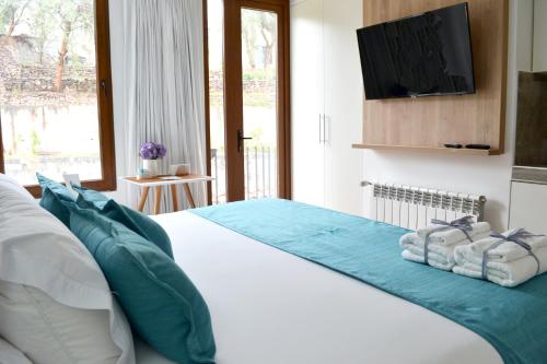 Postel nebo postele na pokoji v ubytování Katari Apart Hotel at Qorikancha