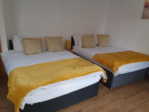 Postel nebo postele na pokoji v ubytování Budget Rooms