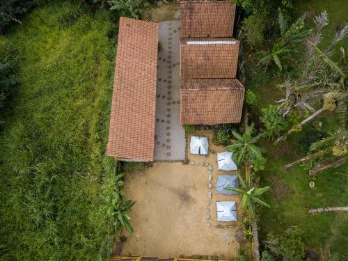 an aerial view of a house with a yard at Greensoul Hospedagem in Ubatuba