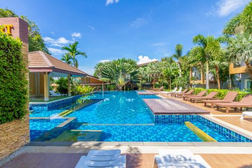 an image of a swimming pool at a villa at Phutara Lanta Resort - SHA Extra Plus Koh Lanta in Ko Lanta