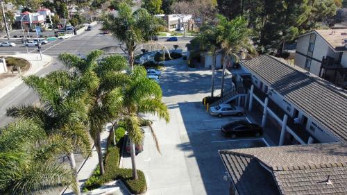 an aerial view of a street with palm trees at Americas Best Value Inn Oxnard-Port Hueneme in Port Hueneme