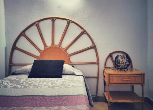 Postel nebo postele na pokoji v ubytování Casita de la Playa, La Aldea de San Nicolás