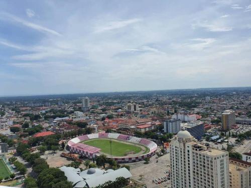 an aerial view of a soccer field in a city at Nice stay in heart of Kota Bharu@Troika,free Wifi. in Kota Bharu