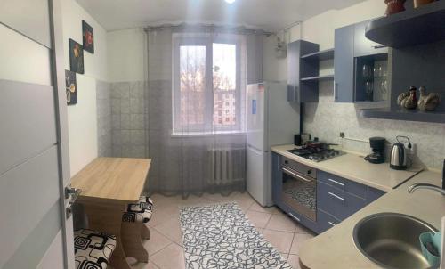 A cozinha ou cozinha compacta de Lovely Brand New Apartment with 2 Rooms and Balcony