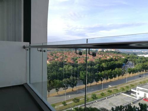 a window in a building with a view of a street at Teduhan Kasih Homestay in Putrajaya