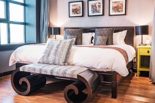Ένα ή περισσότερα κρεβάτια σε δωμάτιο στο Gracie Art Hotel