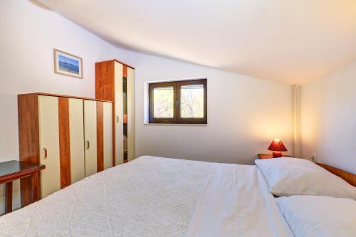 Ένα ή περισσότερα κρεβάτια σε δωμάτιο στο Eco Secluded apartments Zabodarski
