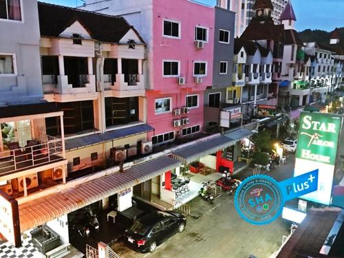 an overhead view of a city street with buildings at Le Tanjong House in Patong Beach