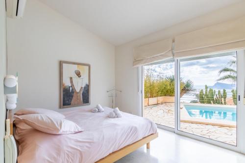 Posteľ alebo postele v izbe v ubytovaní Altea Hills Villa Noruega