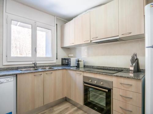 Una cocina o zona de cocina en Apartaments Riu D'Incles